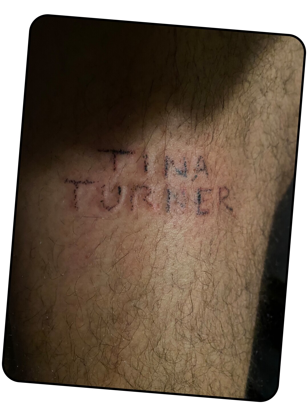 A thigh tattoo that says "Tina Turner."
