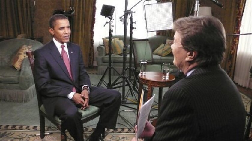 In this Nov. 14, 2008 photo released by CBS, President-elect Barack Obama speaks with CBS' 60 Minutes reporter Steve Kroft in Chicago. (AP Photo/CBS)