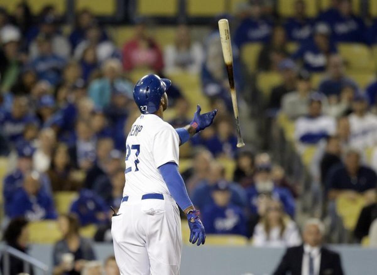 Matt Kemp tosses his bat after striking out Wednesday against the San Francisco Giants.