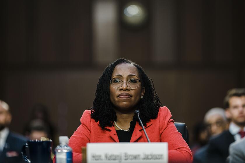 Judge Ketanji Brown Jackson listens to a question during her Senate Judiciary Committee confirmation hearing Tuesday.