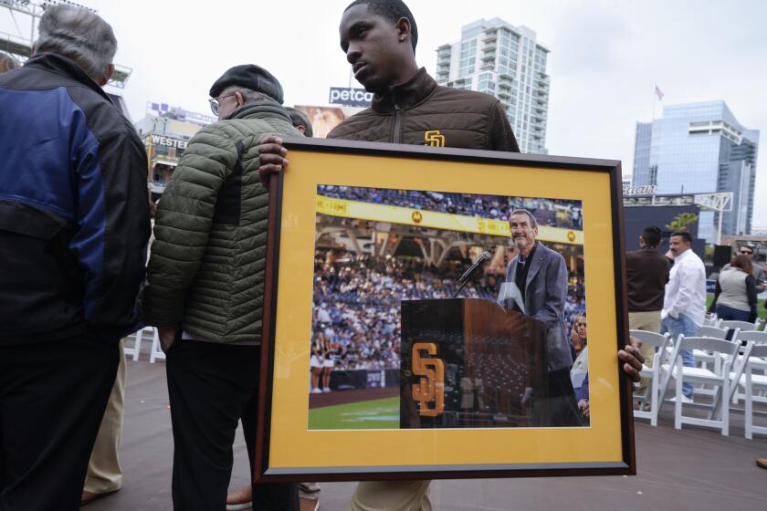 San Diego, CA - March 23: The framed photo of Peter Seidler that was on display during the public Celebration of Life held at Petco Park on Saturday, March 23, 2024, in San Diego. (Nelvin C. Cepeda / The San Diego Union-Tribune)