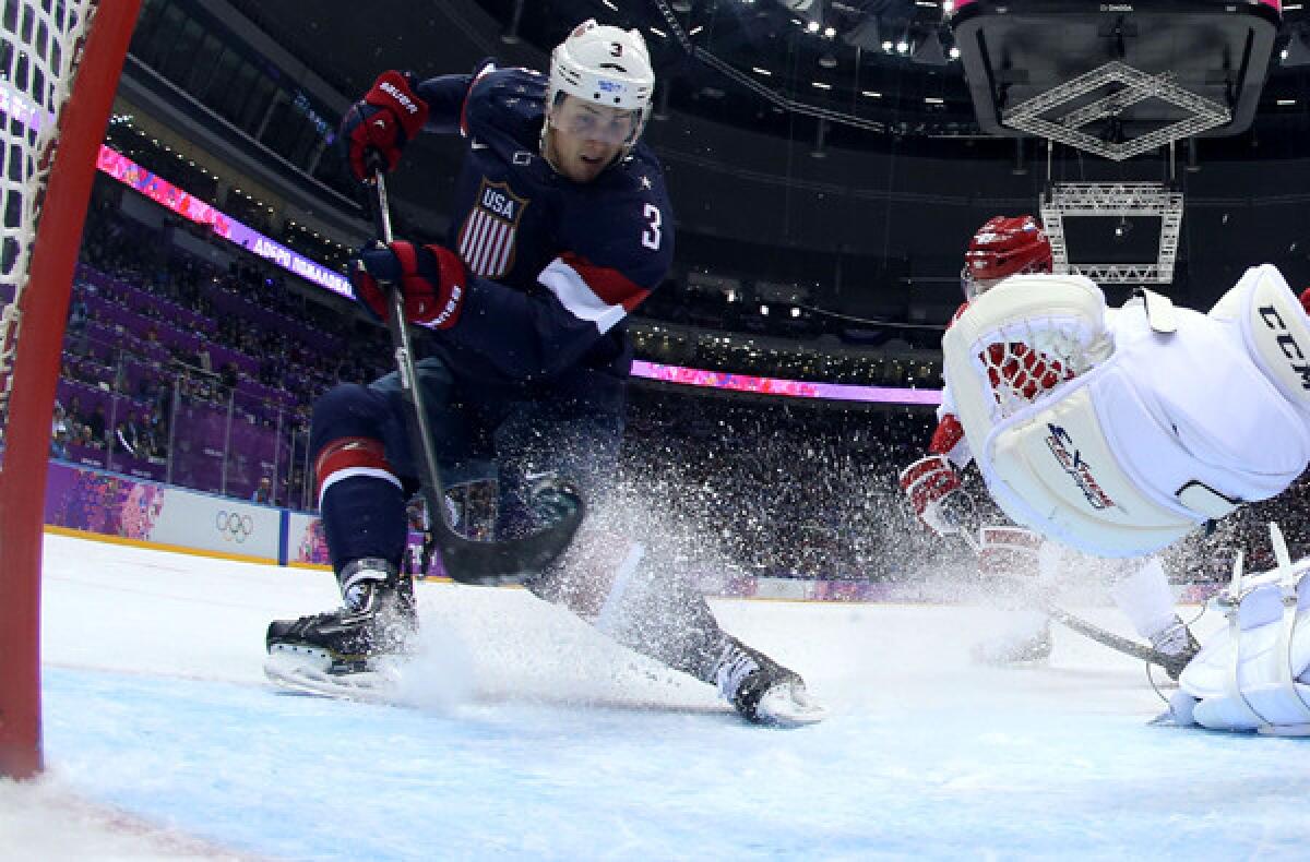 U.S. defenseman Cam Fowler scores against Russia in a preliminary-round game at the Sochi Olympics on Saturday at the Bolshoy Ice Dome.