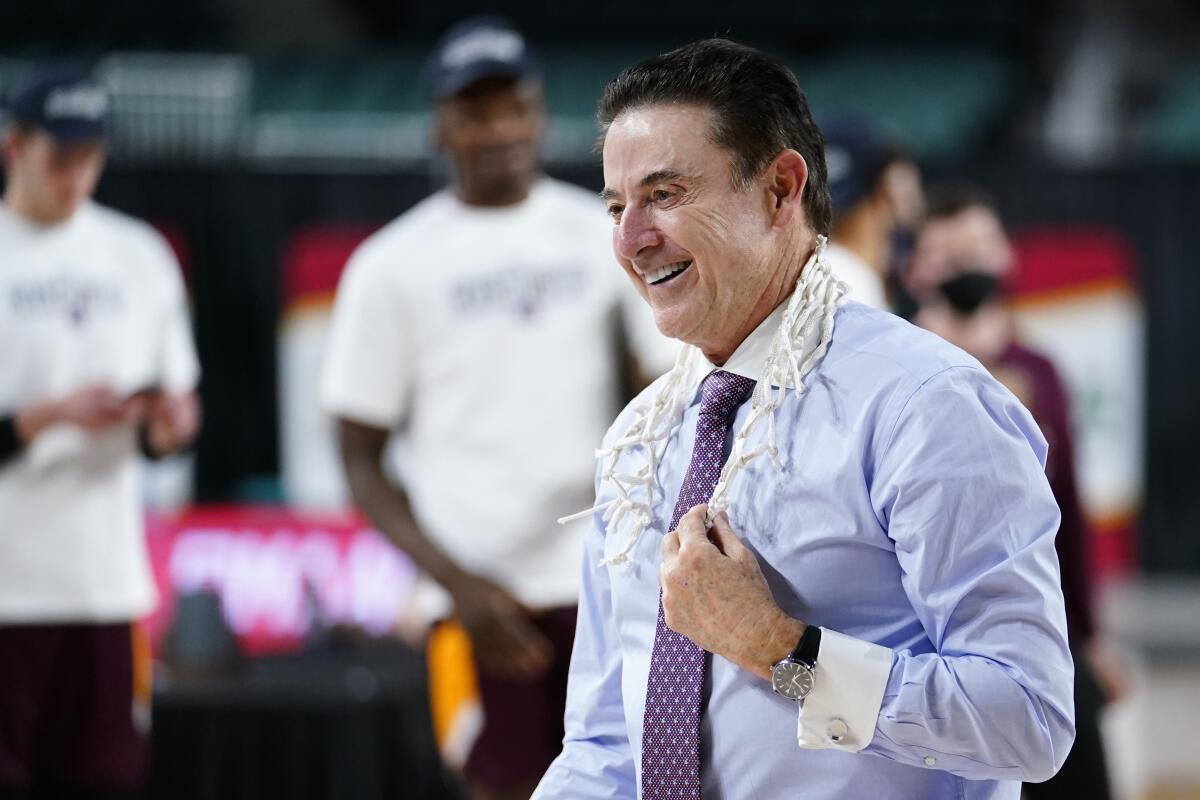 Iona coach Rick Pitino celebrates after his team beat Fairfield on March 13, 2021, in Atlantic City, N.J.