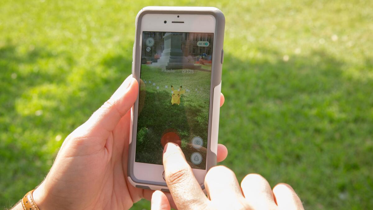A man snatched a smartphone from two teenagers playing 'Pokemon Go' in San Francisco.