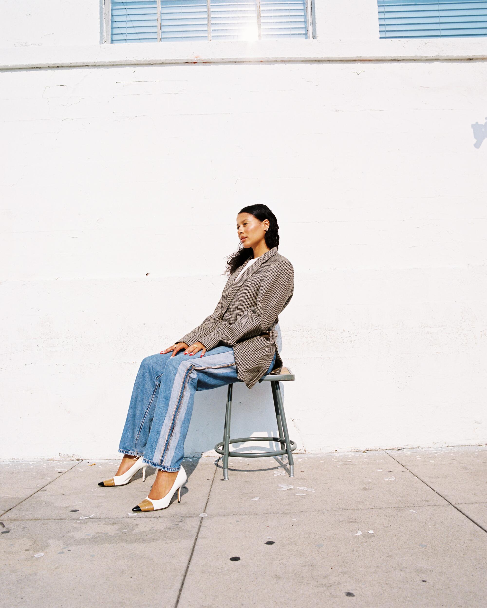 Sami Miró in One of One Blazer, Sami Miro Vintage Asymmetrical White Tee, Porterhouse Jeans in Vintage Blue, Burberry shoes