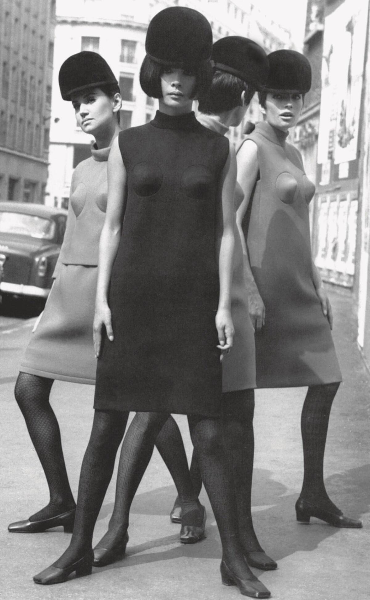 Pierre Cardin's cocktail dresses with conical breasts, 1966.