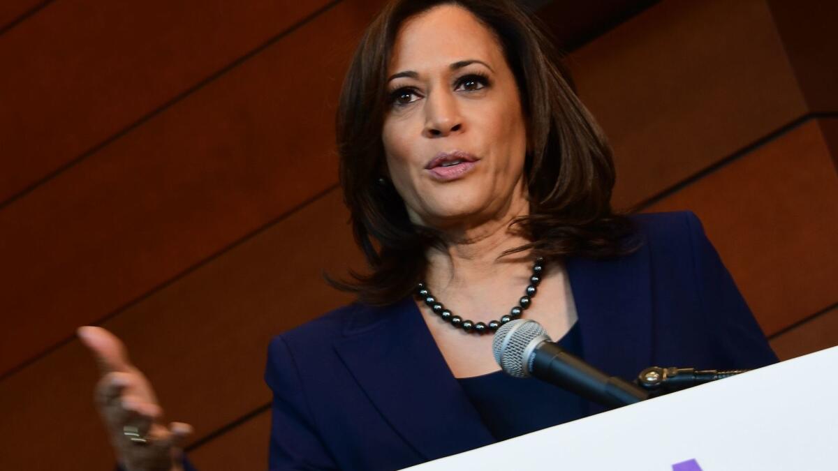 Sen. Kamala Harris speaks to reporters Jan. 21 at Howard University in Washington.