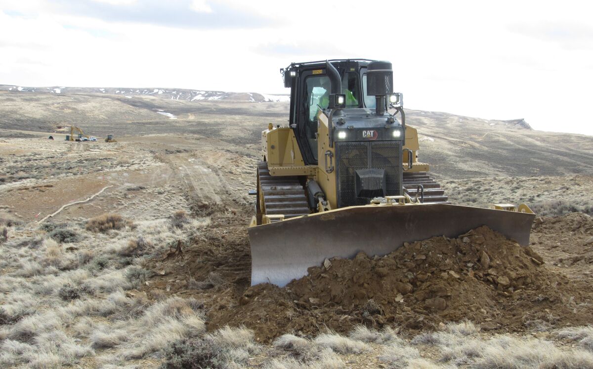 Road construction is underway for a giant wind farm at Phil Anschutz's Overland Trail Ranch in Wyoming.
