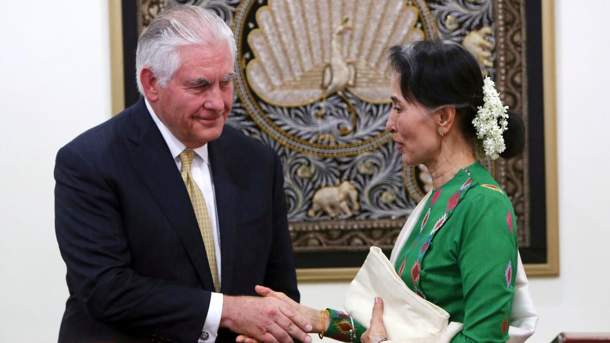 Myanmar leader Aung San Suu Kyi greets visiting U.S. Secretary of State Rex Tillerson on Wednesday.