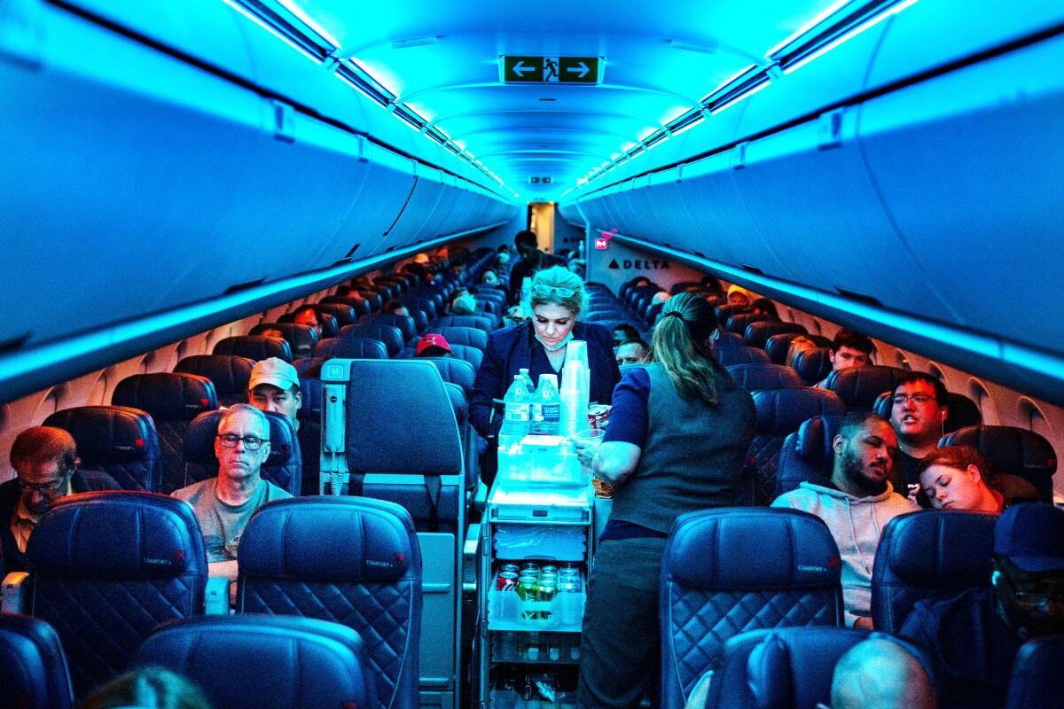 The inside of a plane cabin. 