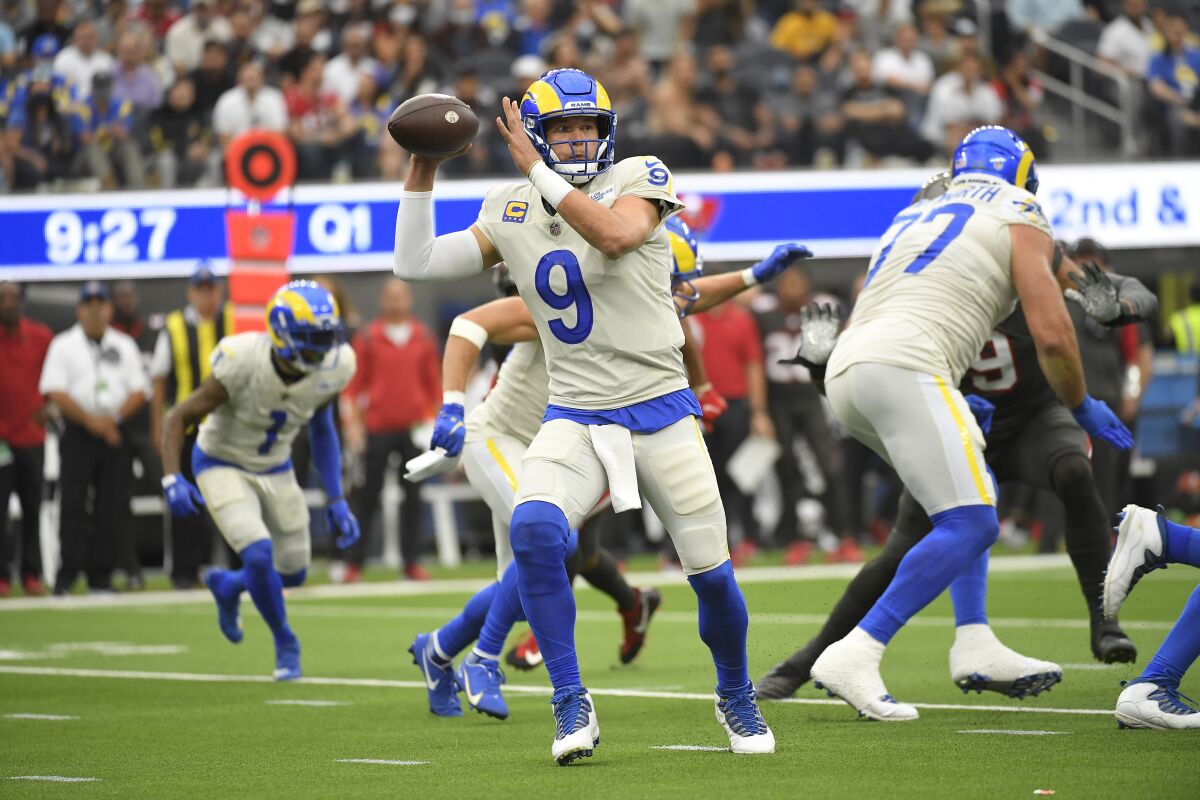 Los Angeles Rams quarterback Matthew Stafford (9) throws during the first half.