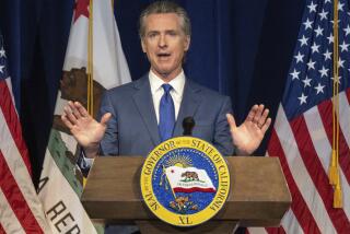 California Gov. Gavin Newsom announces the May budget revision on Friday, May 12, 2023 in Sacramento, Calif. Newsom said Friday the state's budget deficit has grown to nearly $32 billion. That's about $10 billion more than predicted in January, when the governor offered his first budget proposal. (Hector Amezcua/The Sacramento Bee via AP)