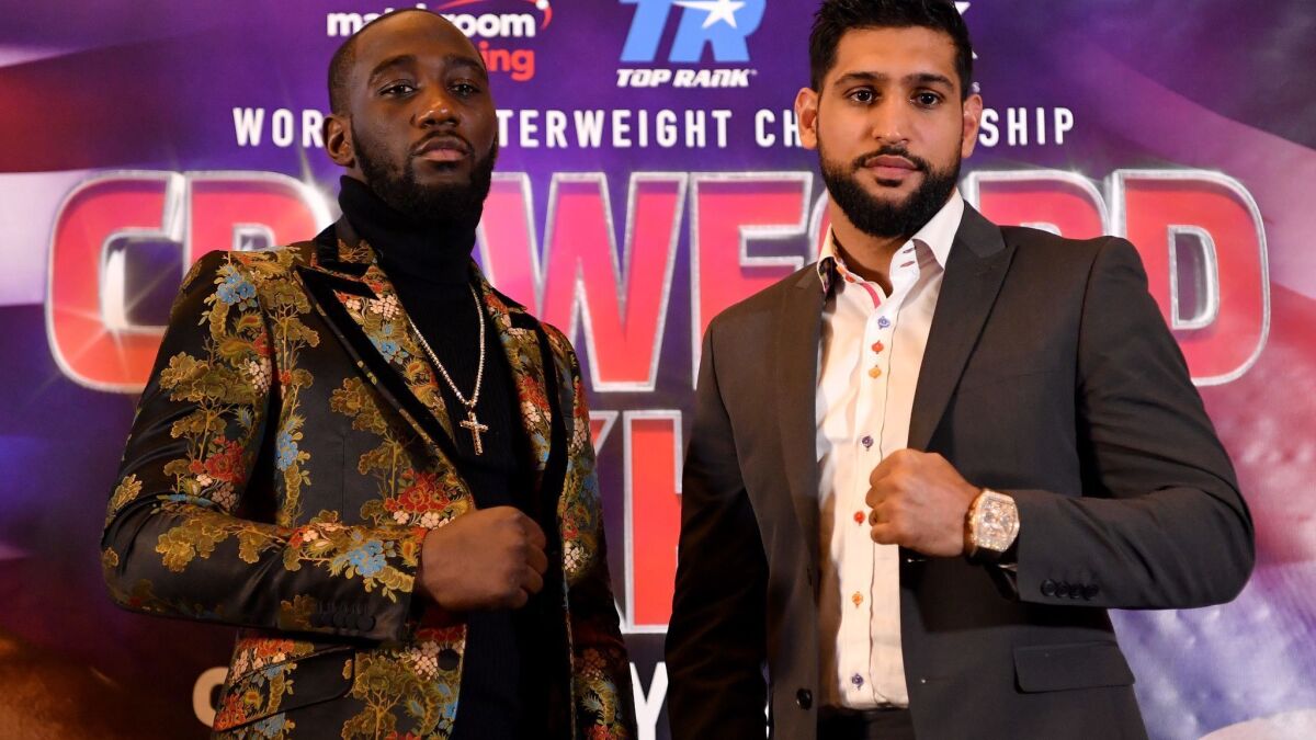 Terence Crawford, left, and Amir Khan at a news conference on Jan. 15 in London.