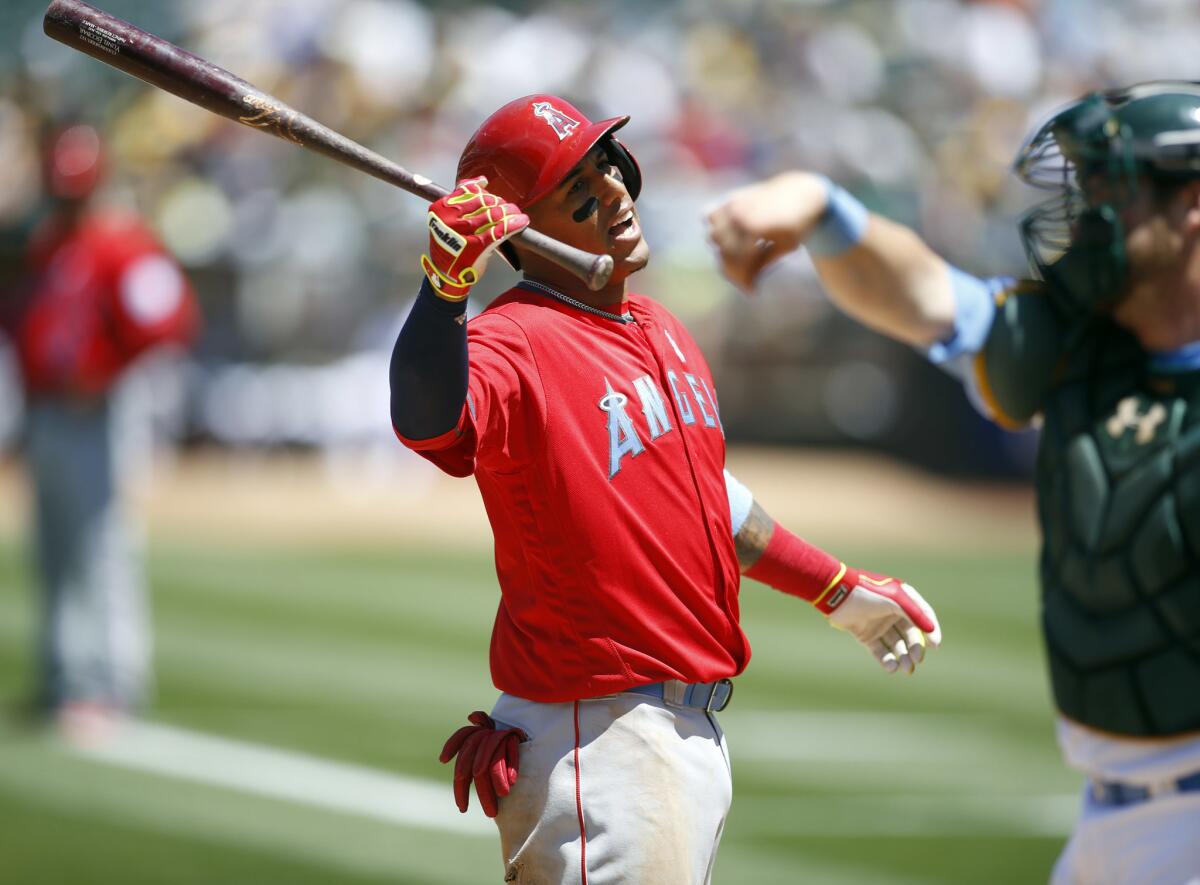 Angels third baseman Yunel Escobar reacts after being called out on strikes against the Oakland Athletics on June 19.