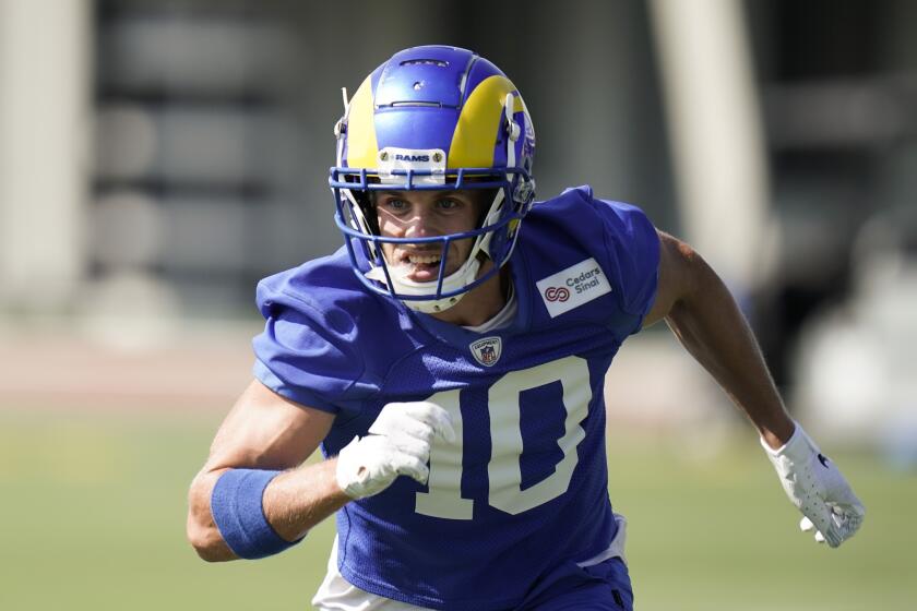 Los Angeles Rams wide receiver Cooper Kupp runs during an NFL football camp practice.