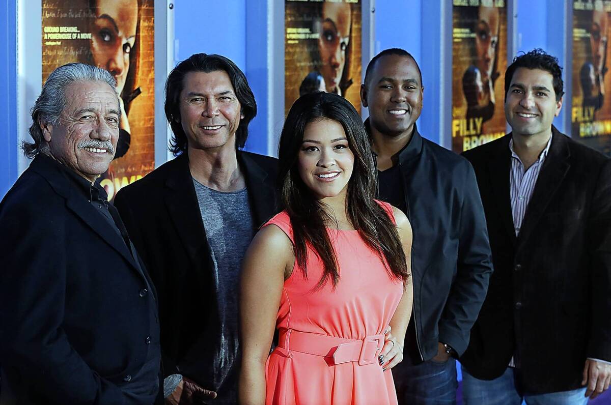 Actors Edward James Olmos, left, Lou Diamond Phillips and Gina Rodriguez partnered with directors Youssef Delara and Michael D. Olmos (son of James), right, on the movie "Filly Brown," which also stars the late Norteno singer Jenni Rivera.