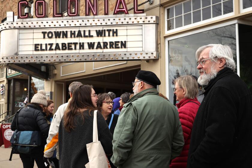 KEENE, NEW HAMPSHIRE - FEBRUARY 04: People stand in line outside The Colonial Theater to attend a campaign event with Democratic presidential candidate Sen. Elizabeth Warren (D-MA) February 04, 2020 in Keene, New Hampshire. Warren is campaigning in New Hampshire after technical errors prevented the Iowa Democratic party from quickly announcing a winner in their caucus, the first big presidential election test of the year. (Photo by Chip Somodevilla/Getty Images) ** OUTS - ELSENT, FPG, CM - OUTS * NM, PH, VA if sourced by CT, LA or MoD **