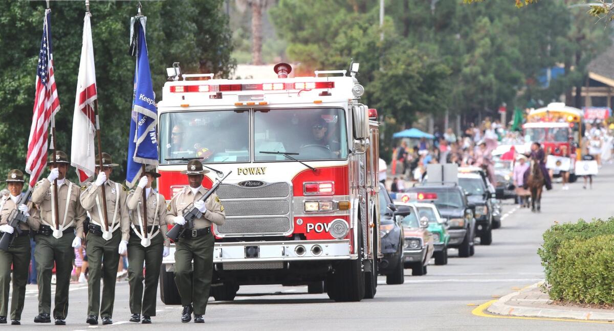 The San Diego Sheriff’s Department Honor Guard, followed by the Poway Fire Department led the 51st annual Poway Days Parade.