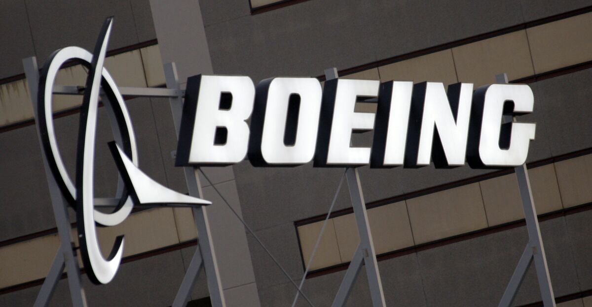 FILE - In this Jan. 25, 2011 file photo, the Boeing Company logo on the property in El Segundo, Calif. Boeing says aircraft deliveries are the strongest it has seen since March 2019. Boeing said Tuesday, July 12, 2022 that it delivered 51 passenger and cargo planes in June, as airlines continued to see a recovery in demand for travel. (AP Photo/Reed Saxon, File)