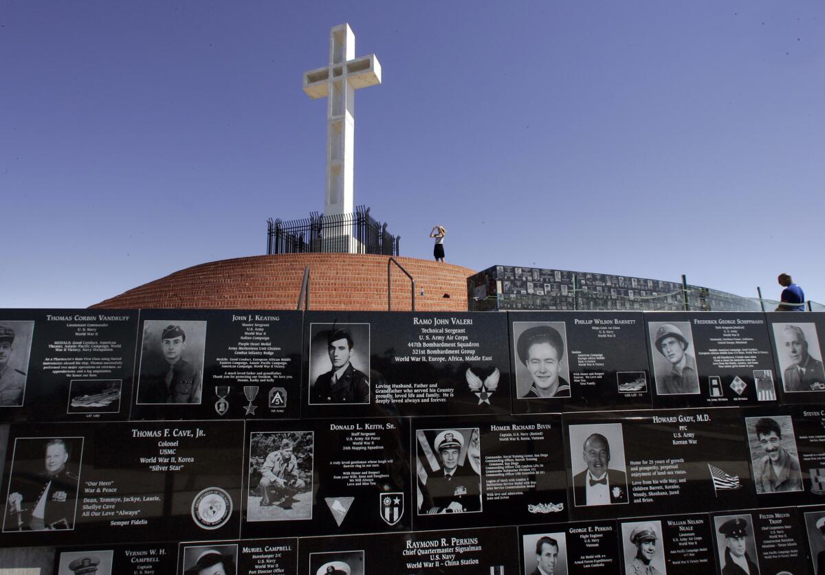 The 43-foot-tall cross atop Mt. Soledad and the plaques dedicated to veterans of all faiths. Proponents say the plaques make the site a war memorial, not just a religious symbol.