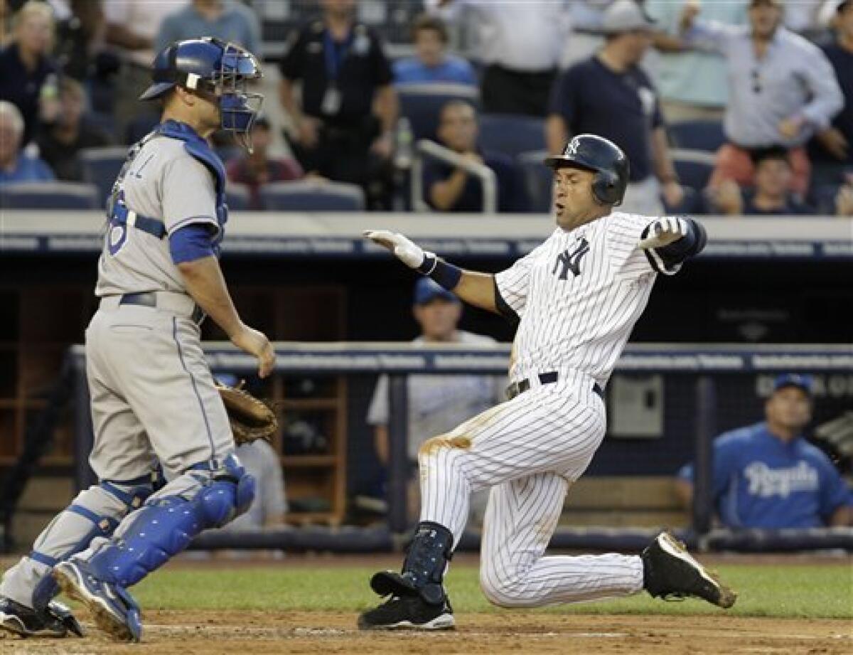 New York Yankees Derek Jeter hits an inside the park home run in the third  inning against the Kansas City Royals at Yankee Stadium in New York City on  July 22, 2010.