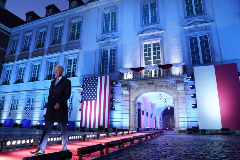 President Joe Biden arrives to speak about the Russian invasion of Ukraine, at the Royal Castle, in Warsaw, Saturday, March 26, 2022. (AP Photo/Evan Vucci)