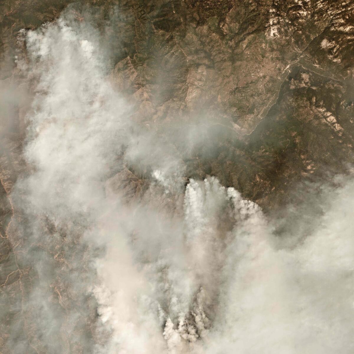 This handout satellite picture taken July 28 shows smoke rising from the Ferguson fire in California.
