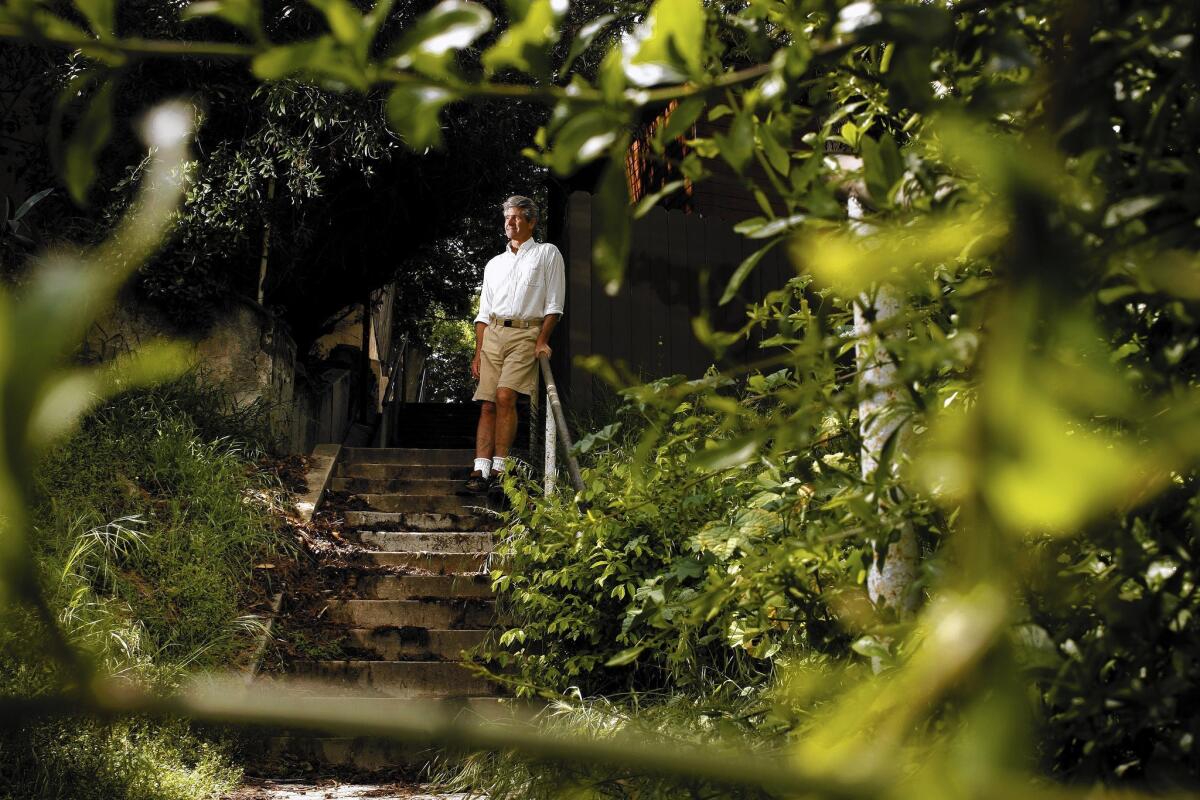 Charles Fleming, atop one of the "secret stairs" he grew to love, and write about.