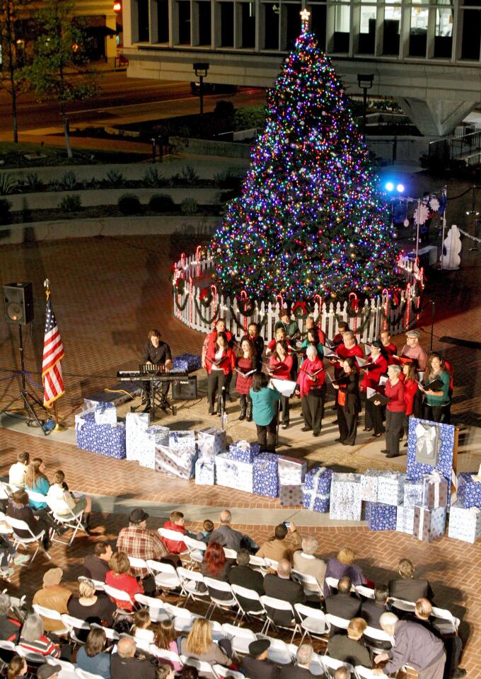 The Nestlé Choir sang Christmas songs at the holiday tree lighting ceremony at Perkins Plaza in Glendale on Wednesday, December 2, 2015.
