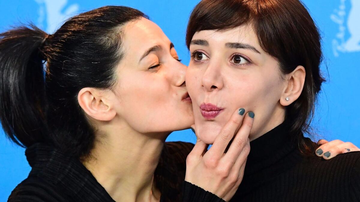 Turkish director Ceylan Ozgun Ozcelik, left, and Turkish actress Algi Eke in Berlin for the 67th Berlinale film festival where the film "Kaygi" ("Inflame"). screened in February 2017.