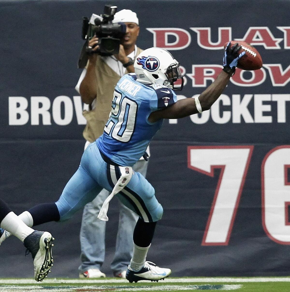 Tennessee cornerback Alterraun Verner celebrates after scoring on an interception return against the Houston Texans last month. Verner has been a problem solver for the Titans' defense.