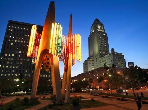 Officials lighted a newly restored Triforium at Temple and Main streets in December 2006. The sculpture had problems since its unveiling in 1975.