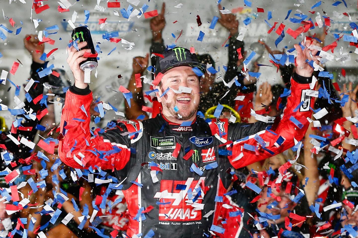 Kurt Busch, driver of the No. 41 Haas Automation/Monster Energy Ford, celebrates in Victory Lane after winning the 59th annual Daytona 500.