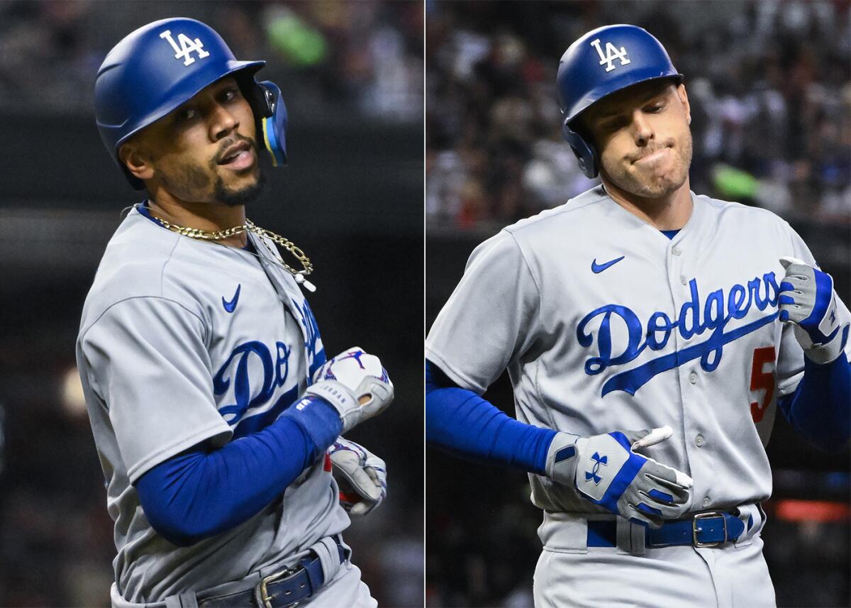 Dodgers stars Mookie Betts, left, and Freddie Freeman during Game 3 of the NLDS.