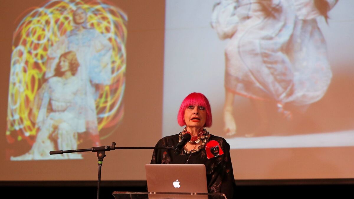 British fashion designer Zandra Rhodes shares her experiences with fashion and costume design during a talk at Huntington Beach High School on Tuesday. Rhodes has designed clothes for celebrities such as Princess Diana, Freddie Mercury and Joan Rivers.