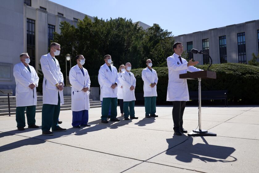 Dr. Sean Conley, physician to President Donald Trump, briefs reporters at Walter Reed National Military Medical Center in Bethesda, Md., Saturday, Oct. 3, 2020. Trump was admitted to the hospital after contracting the coronavirus. (AP Photo/Susan Walsh)