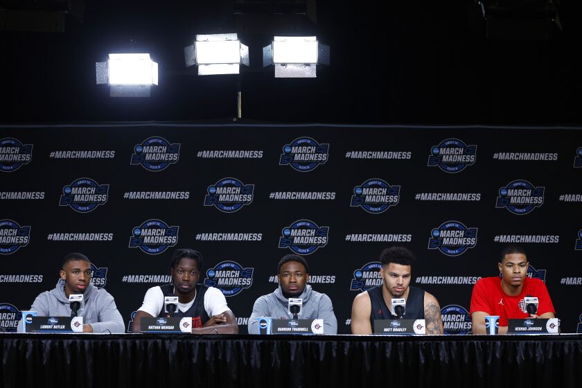 Louisville, KY - March 23: San Diego State's (from left) Lamont Butler, Nathan Mensah, Darrion Trammell, Matt Bradley and Keshad Johnson listen to a question during a news conference in Louisville on Thursday, March 23, 2023. The Aztecs face Alabama in a Sweet 16 game. (K.C. Alfred / The San Diego Union-Tribune)
