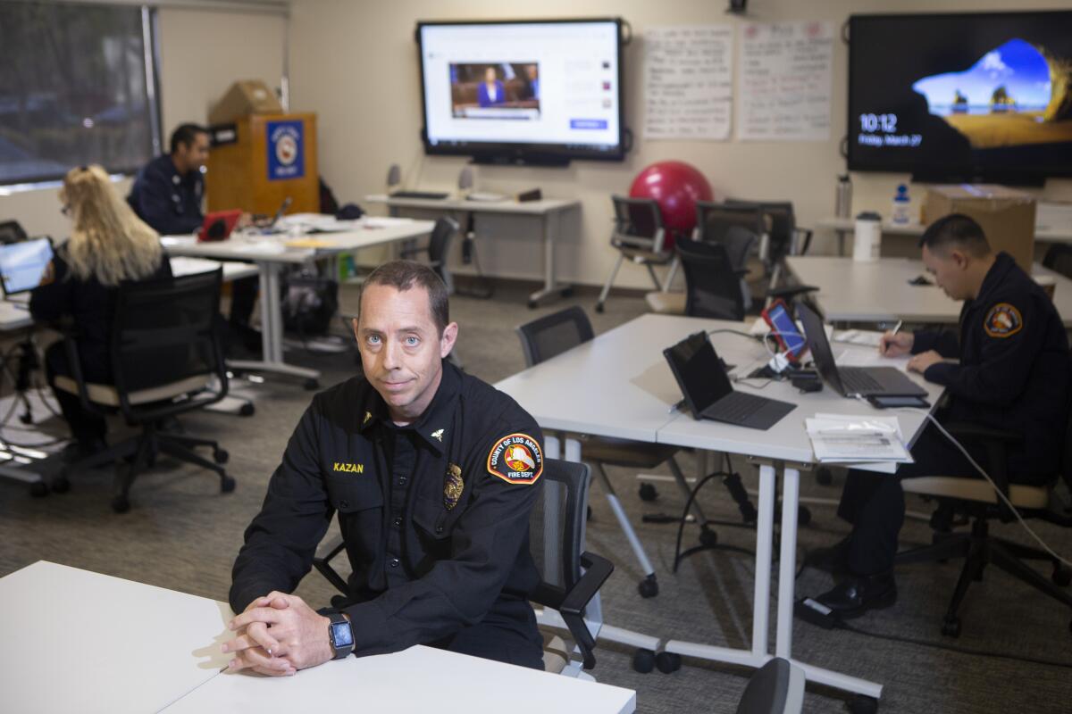 Clayton Kazan, an ER physician and medical director at the L.A. County Fire Department, at his office in Monterey Park. He is coordinating testing in the county.