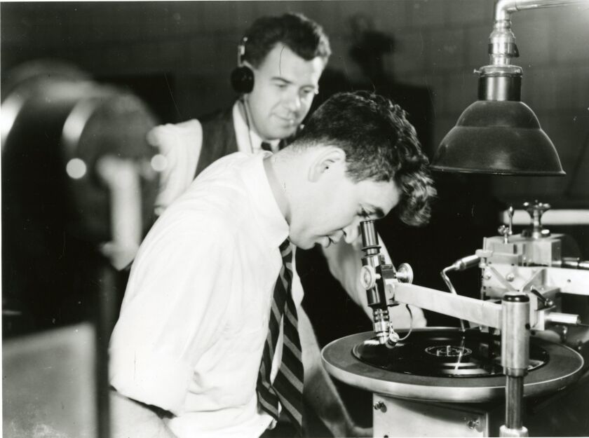 Sound engineer cutting a record lacquer