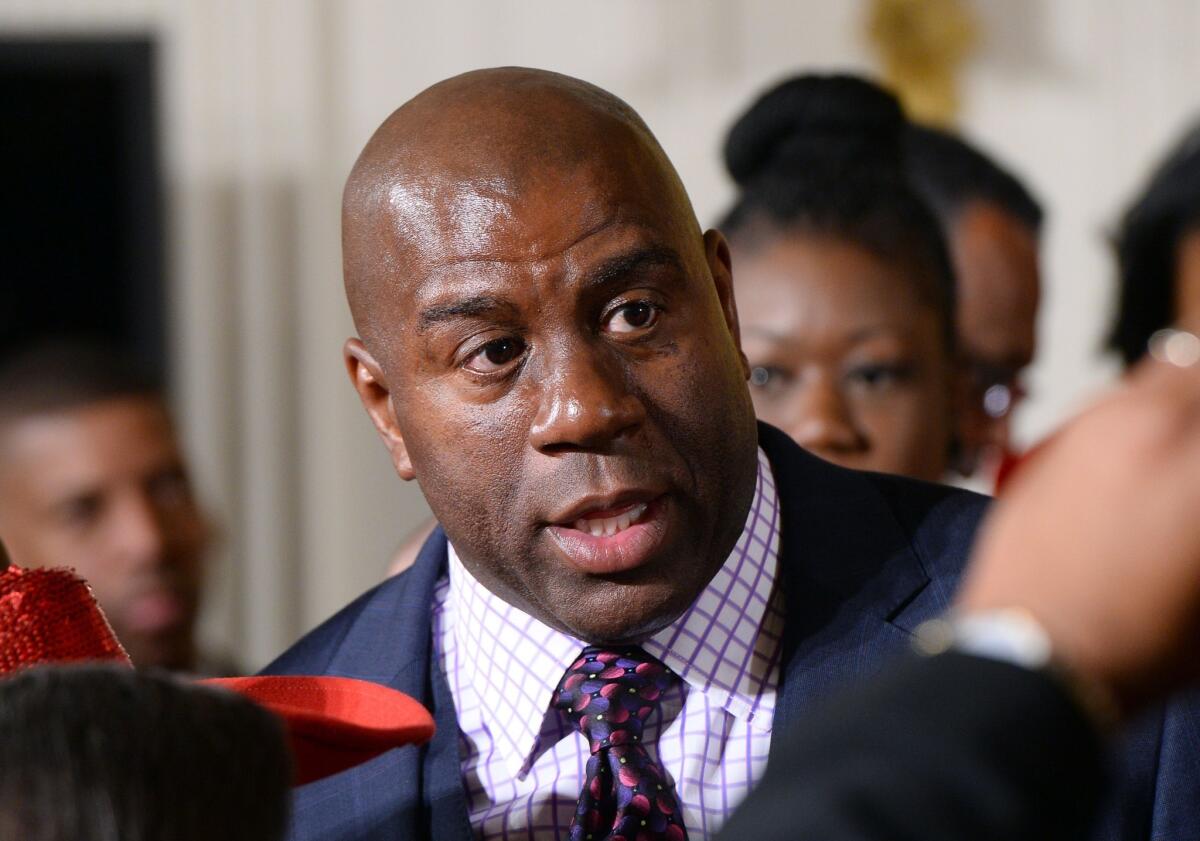 Magic Johnson attends an event at the White House on Feb. 27, 2014.