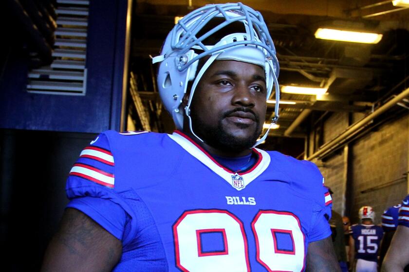 Bill defensive tackle Marcell Dareus before a game against the Dolphins last season.