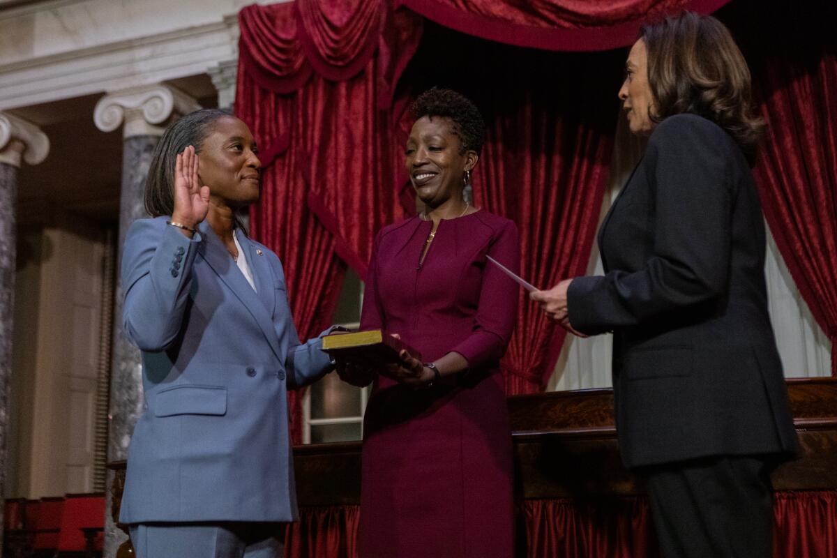 Sen. Laphonza Butler (D-Ca.) is sworn in by Vice President Kamala Harris at the Capitol in Washington on Oct. 3. 