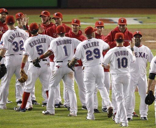 Texas Rangers' Mike Napoli breaks hits bat while grounding out during the  fourth inning during Game 3 of baseball's American League championship  series against the Detroit Tigers, Tuesday, Oct. 11, 2011, in