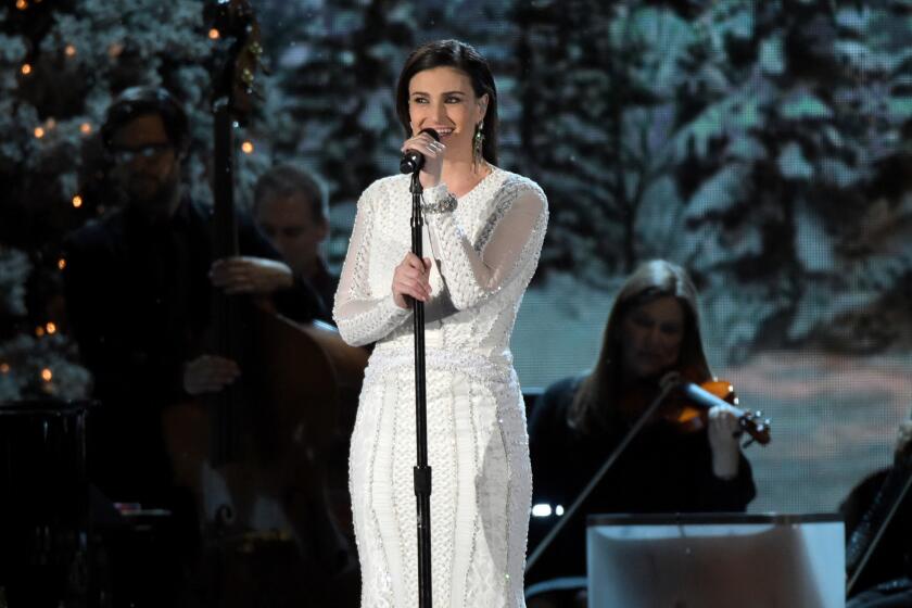 Singer Idina Menzel will embark on a global concert tour in 2015.