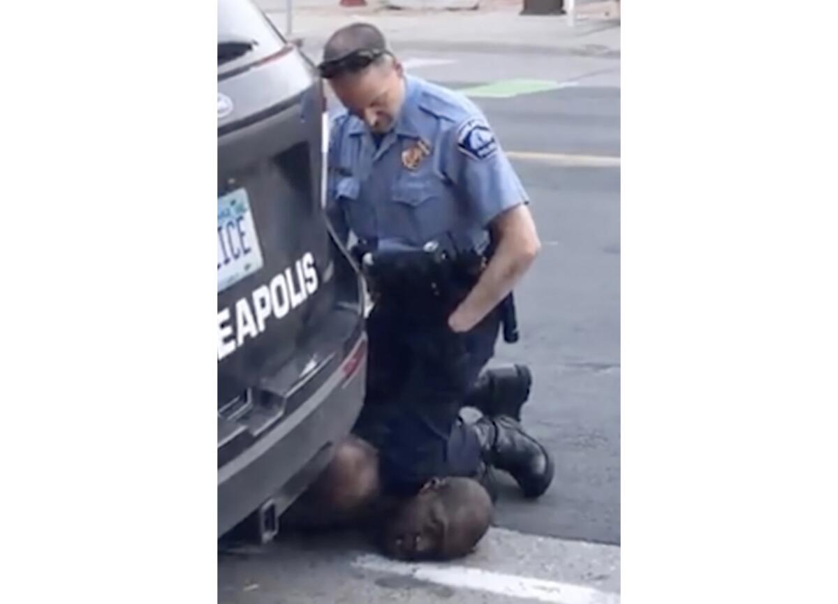 FILE - In this Monday, May 25, 2020, file frame from video provided by Darnella Frazier, then-Minneapolis Police Officer Derek Chauvin kneels on the neck of George Floyd, a handcuffed man who was pleading that he could not breathe. As the trial approaches for Chauvin, who is charged with murder in Floyd's death, prosecutors are putting the time Chauvin's knee was on Floyd's neck at about nine minutes. The time has fluctuated before. (Darnella Frazier via AP, File)