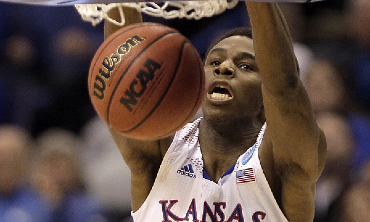 Kansas guard Andrew Wiggins dunks during the Jayhawks' 80-69 NCAA tournament win over Eastern Kentucky on March 21.