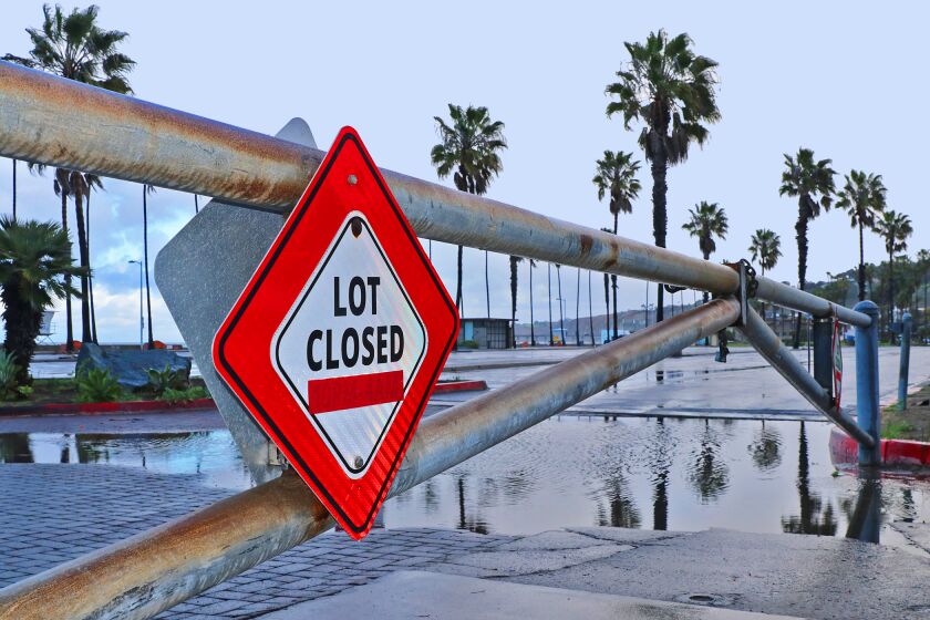 The parking lot to La Jolla Shores beach has been closed since March 22, 2020 to discourage gatherings and people getting in close contact during the coronavirus pandemic. Later in the day, San Diego Mayor Kevin Faulconer went even further and closed all City beaches, parks, bays, boardwalks and trails in San Diego. (Individuals who are practicing social distancing, not forming a group of people and staying 6-feet apart from people not in one's household are still allowed to go for a walk/jog and walk their dog.)
