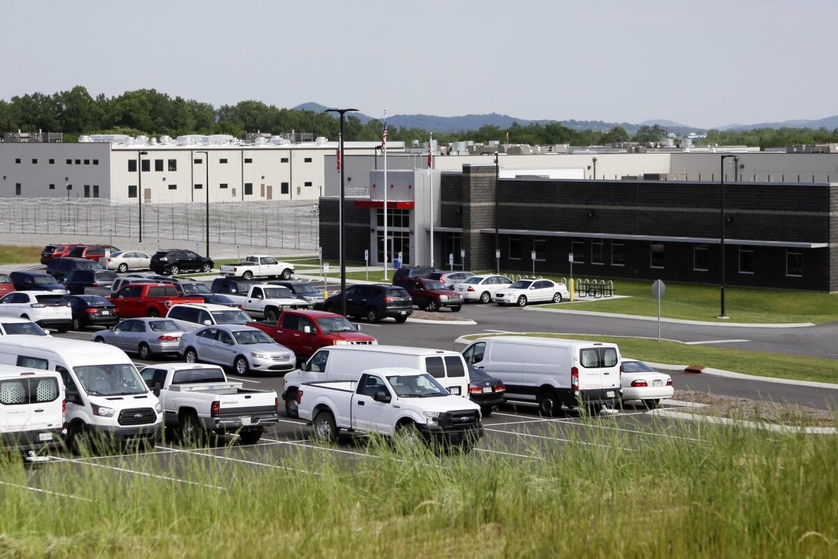 FILE - Trousdale Turner Correctional Center, managed by CoreCivic, is pictured on May 24, 2016, in Hartsville, Tenn. On Friday, July 15, 2022, a federal magistrate judge ordered an attorney suing CoreCivic over an inmate's death to delete certain tweets — some of which describe the company as a “death factory” — and restrict his public commentary going forward. (AP Photo/Mark Humphrey, File)