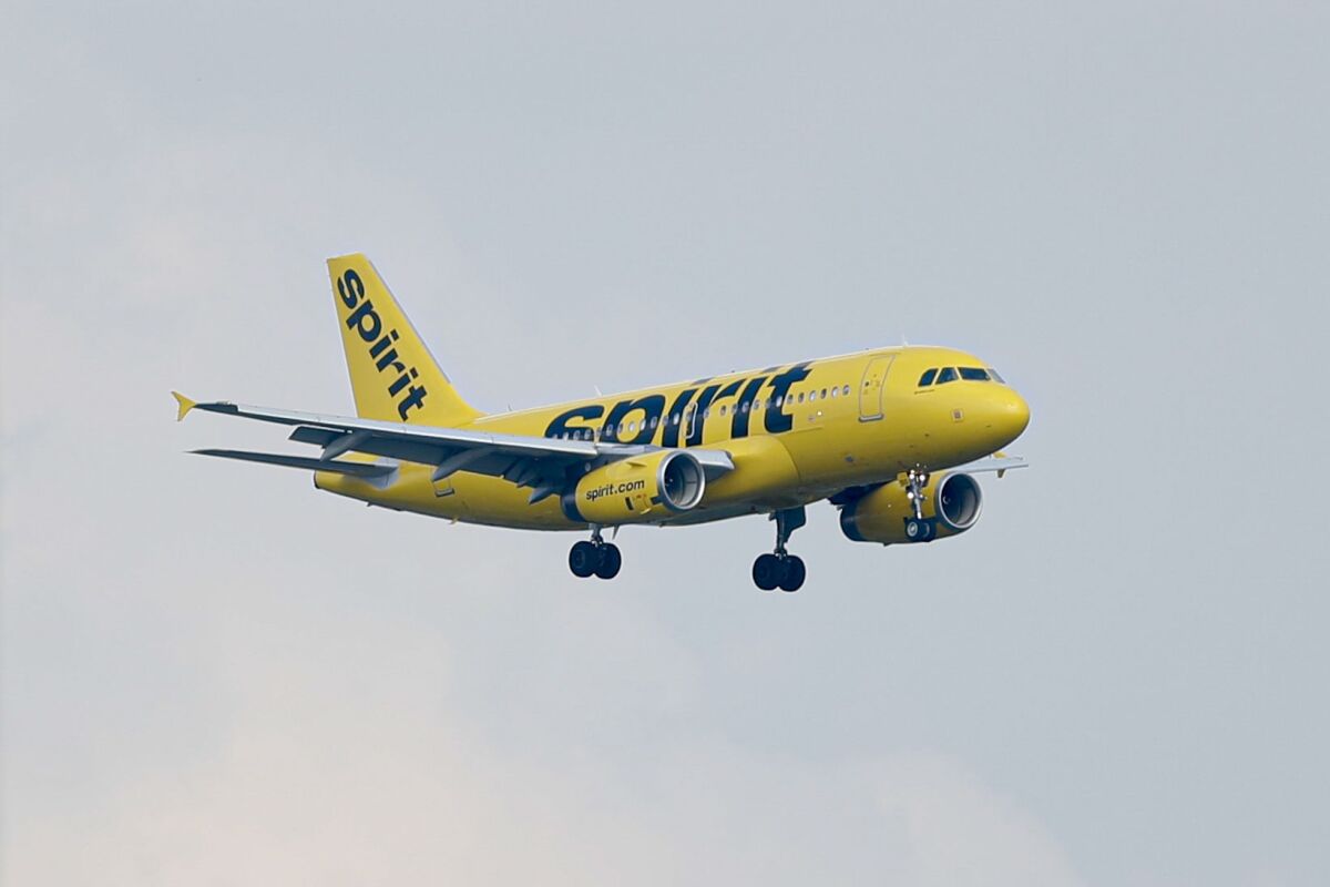 FILE - In this July 28, 2019, file photo, a Spirit Airlines jet comes in for a landing at the airport in Latrobe, Pa. Spirit Airlines is moving its operations control center from South Florida to just outside Nashville, Tenn., after recent hurricanes forced the low-cost carrier to temporarily move some staff during storms, the company said Friday, Feb. 14, 2020. (AP Photo/Keith Srakocic, File)