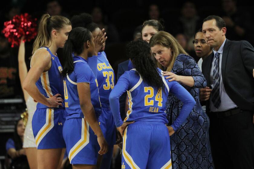 LOS ANGELES, CA - JANUARY 17, 2020: UCLA Bruins head coach Cori Close talks to her team during a timeout against USC at Galen Center on January 17, 2020 in Los Angeles, California.(Gina Ferazzi/Los AngelesTimes)